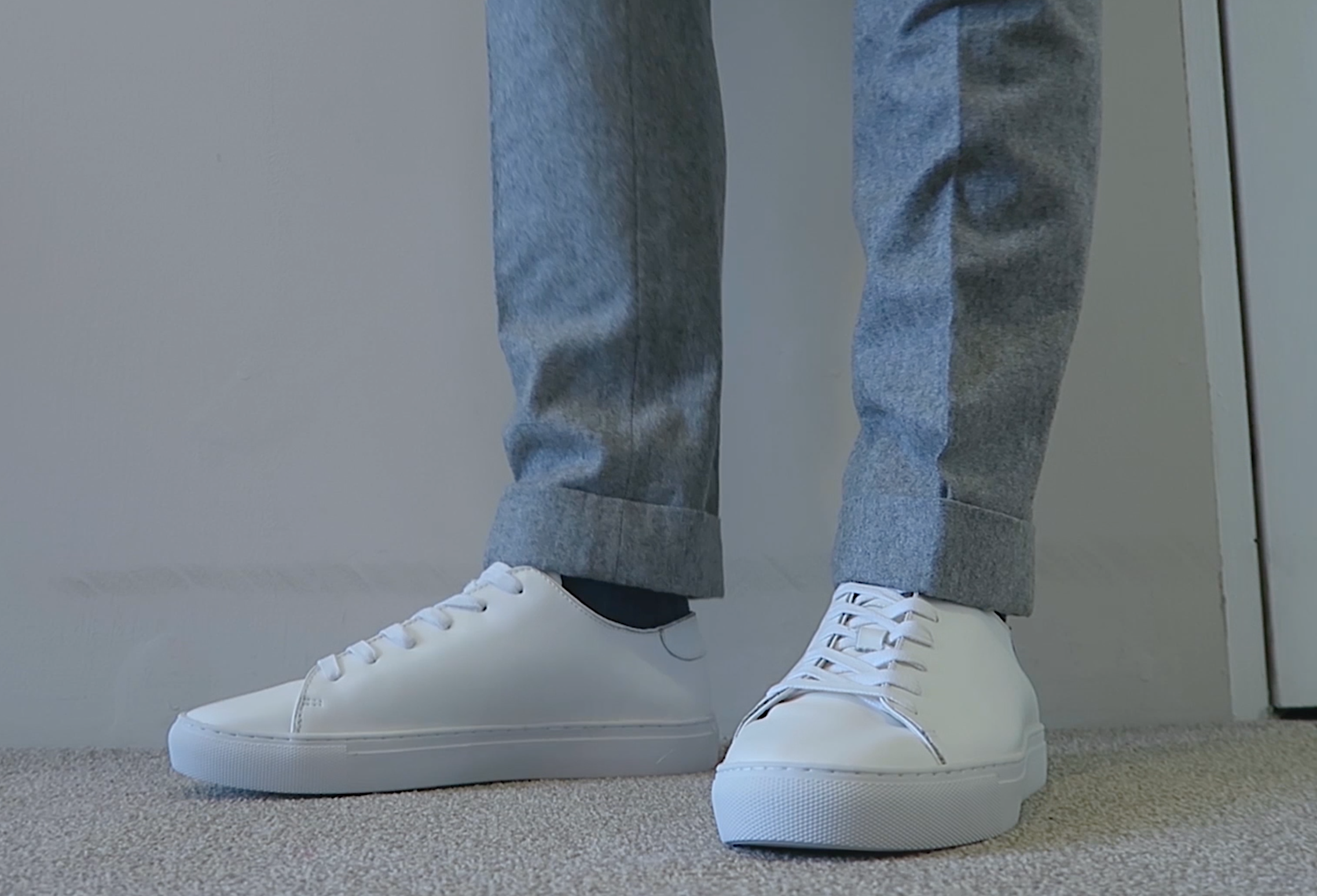 white sneakers wool trousers